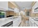 Bright kitchen with stainless steel appliances, ample counter space, and open layout at 8065 W Eastman Pl # 6-102, Denver, CO 80227