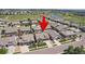 Bird's-eye view of the property showcasing the home's location within a well-planned community with nearby amenities at 15565 E 115Th Ave, Commerce City, CO 80022