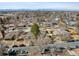 Expansive aerial view of a neighborhood highlighting residential streets, houses, and trees at 1173 Dallas St, Aurora, CO 80010