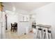 View of the open dining area and living room at 1173 Dallas St, Aurora, CO 80010