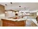 Basement bar area with a marble countertop, sink, and shuttered windows at 5929 Dunraven Way, Golden, CO 80403