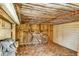 Shed interior with bike rack, bikes, and wood paneled walls at 5929 Dunraven Way, Golden, CO 80403