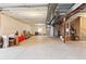 Spacious unfinished basement with exposed ceiling and utilities, ready for your personal touch at 18809 W 92Nd Dr, Arvada, CO 80007