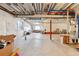 Unfinished basement offering potential for customization with exposed ceilings and concrete floor at 18809 W 92Nd Dr, Arvada, CO 80007