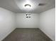 Finished basement featuring new carpet and freshly painted walls, ready for personalization at 6757 Lee St, Arvada, CO 80004