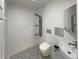 Modern bathroom showcasing a rainfall shower and stylish tile flooring at 6757 Lee St, Arvada, CO 80004