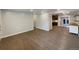 Spacious living room featuring hardwood floors, neutral walls, and recessed lighting at 6757 Lee St, Arvada, CO 80004