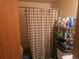 Cozy bathroom offers shower and shelving at 8611 Emerson Ct, Denver, CO 80229