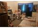 Bright bedroom with window and ample closet space at 8611 Emerson Ct, Denver, CO 80229