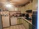 The outdated kitchen is ready for an upgrade at 8611 Emerson Ct, Denver, CO 80229