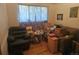 Inviting living room offers space and light at 8611 Emerson Ct, Denver, CO 80229