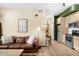 Cozy living area featuring a modern kitchen, comfortable seating, and stylish decor at 603 Inca St # 432, Denver, CO 80204