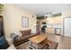 Stylish living room featuring modern kitchen, comfortable seating, and contemporary decor at 603 Inca St # 432, Denver, CO 80204