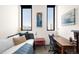 Comfortable office space featuring a desk, day bed, and natural light at 603 Inca St # 432, Denver, CO 80204