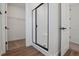 Modern bathroom features a glass shower door and a walk-in closet at 8644 Pennycress Dr, Littleton, CO 80125