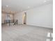 Open loft area with neutral carpeting and a view of downstairs at 8644 Pennycress Dr, Littleton, CO 80125