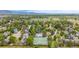 Community with outdoor amenities, including a pool and tennis courts, surrounded by leafy trees at 79 Huron Ct, Boulder, CO 80303