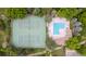 Aerial top down view of tennis courts and outdoor community pool, perfect for recreation at 79 Huron Ct, Boulder, CO 80303