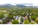 Spacious neighborhood surrounded by lush greenery with stunning mountain views in the distance at 79 Huron Ct, Boulder, CO 80303