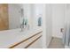 Bathroom featuring a large mirror, white vanity, and tiled flooring at 79 Huron Ct, Boulder, CO 80303