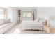 Bright bedroom featuring neutral decor, natural light, a cozy window seat, and carpeted floors at 79 Huron Ct, Boulder, CO 80303