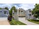 Two-story home with a private garage, verdant yard, and mature trees at 79 Huron Ct, Boulder, CO 80303