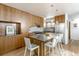 Modern kitchen with stainless steel appliances, hardwood floors, an island and pendant lighting at 79 Huron Ct, Boulder, CO 80303