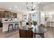 Well-designed kitchen flows into the dining and living area, perfect for entertaining at 1356 S Boston Ct # A, Denver, CO 80247