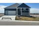 Charming single-story home showcasing a pristine front yard and attached garage, perfect for comfortable living at 42998 Colonial Trl, Elizabeth, CO 80107