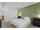 Cozy bedroom featuring a queen bed, and built-in closet for ample storage at 555 E 10Th Ave # 15, Denver, CO 80203