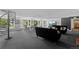 Bright common area features spiral staircase, seating area, and natural lighting at 555 E 10Th Ave # 15, Denver, CO 80203