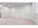 Unfurnished basement room with recessed lighting, neutral walls, and a window at 1308 Stuart St, Denver, CO 80204