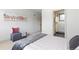 Stylish bedroom with an ensuite bathroom, featuring modern fixtures and finishes at 1308 Stuart St, Denver, CO 80204