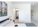Bedroom showcasing an ensuite bathroom, contemporary décor, and neutral tones at 1308 Stuart St, Denver, CO 80204