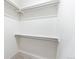 Well-organized walk-in closet with shelving and ample storage space at 1308 Stuart St, Denver, CO 80204