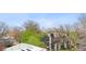 Modern home exterior with a view of downtown city buildings and lush greenery at 1308 Stuart St, Denver, CO 80204