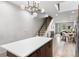 Open-concept living spaces with hardwood floors and stylish modern lighting at 1308 Stuart St, Denver, CO 80204