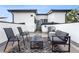 Private rooftop patio features modern outdoor furniture and an air conditioning unit at 1308 Stuart St, Denver, CO 80204