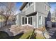 Spacious patio with sliding glass doors leading to the backyard at 780 Utica Ave, Boulder, CO 80304