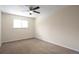 Neutral bedroom with ceiling fan, carpeted floor and natural light at 19038 E Girard Ave, Aurora, CO 80013