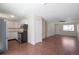 Cozy kitchen with stainless steel appliances, white cabinets, and a light wood countertop at 19038 E Girard Ave, Aurora, CO 80013