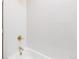 Modern bathroom with white tiled walls and gold shower fixtures at 3071 W 38Th Ave, Denver, CO 80211