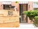 Charming brick home with awning and address marker, creating a welcoming entrance at 3071 W 38Th Ave, Denver, CO 80211