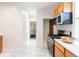 Spacious kitchen with an eat-in kitchen, modern appliances and access to other rooms in the house at 3071 W 38Th Ave, Denver, CO 80211