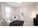 Inviting living room with modern decor, comfortable chairs, and an open doorway at 3071 W 38Th Ave, Denver, CO 80211