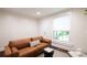 Comfortable living room with natural light, neutral tones, and stylish seating at 3071 W 38Th Ave, Denver, CO 80211