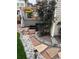 Backyard with a hot tub and a stone pathway lined with decorative rocks and plants at 10232 Yampa Ct, Commerce City, CO 80022