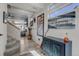 Bright entryway with wood flooring and a staircase leading to the second floor at 10232 Yampa Ct, Commerce City, CO 80022