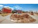 Neighborhood park featuring a picnic shelter, playground, and landscaping at 10232 Yampa Ct, Commerce City, CO 80022