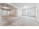 Unfinished basement area with exposed walls and flooring at 9349 Russell Cir, Arvada, CO 80007